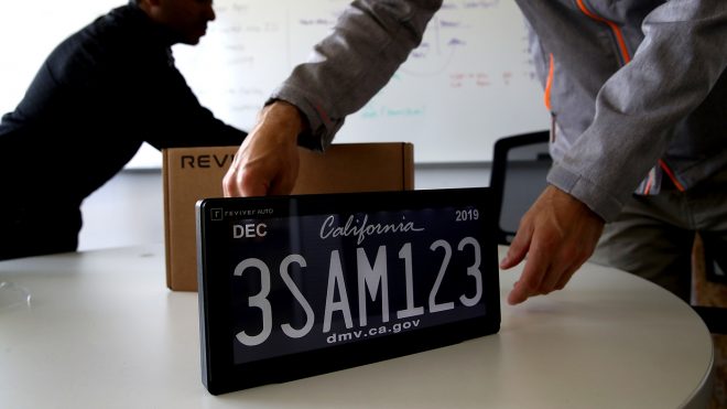 FOSTER CITY, CA - MAY 30:  A digital license plate made by Bay Area company Reviver Auto, part of a pilot project with the state Department of Motor Vehicles, is displayed at Reviver Auto headquarters on May 30, 2018 in Foster City, California. California is the first state in the U.S. to test digital license plates on vehicles. According to the California State Department of Motor Vehicles, there are currently 116 cars in California that are part of a pilot program testing the new plates that will eventually be sold at auto dealerships for $699 plus installation costs. Digital plates are expected to roll out in Florida, Arizona, and Texas later this year.  (Photo by Justin Sullivan/Getty Images)