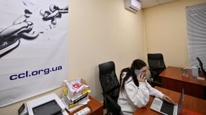 An employee of the Ukraine's Center for Civil Liberties works in the office in Kyiv on October 7, 2022. - Russian President Vladimir Putin should face an "international tribunal", Oleksandra Matviychuk, the head of Ukraine's Center for Civil Liberties said on October 7, 2022 after the group was awarded a Nobel Peace Prize. (Photo by Sergei SUPINSKY / AFP) (Photo by SERGEI SUPINSKY/AFP via Getty Images)