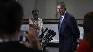 WASHINGTON, DC - AUGUST 01: Sen. Joe Manchin (D-WV) speaks to reporters in the Hart Senate Office building on August 01, 2022 in Washington, DC. Manchin, who returned to Capitol Hill after quarantining with Covid-19, spoke to reporters about the deal he reached with Senate Majority Leader Chuck Schumer (D-NY) on the Inflation Reduction Act of 2022. (Photo by Anna Moneymaker/Getty Images)